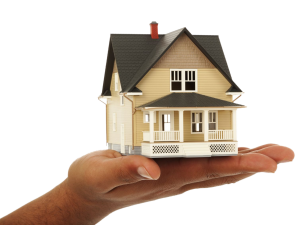 House in hand representing cash home sale